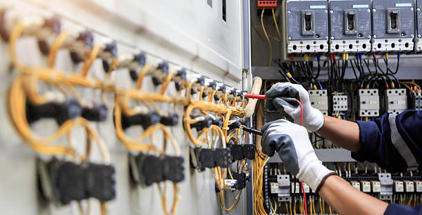 Professional Electrician technician working in Groves, TX